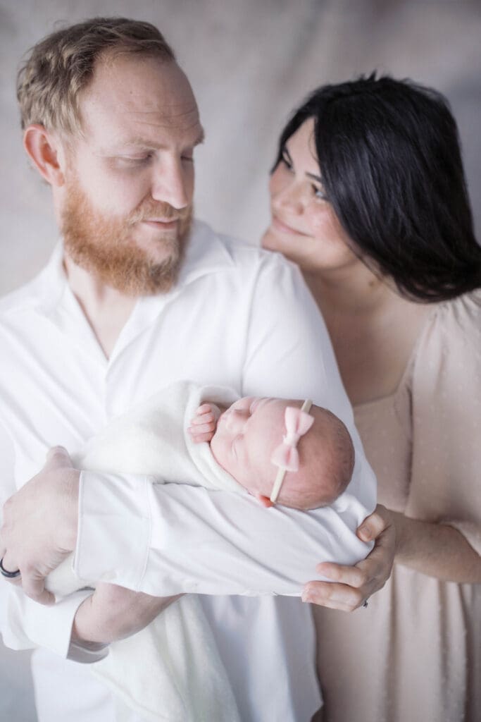 In-home newborn photography session in Jacksonville documenting family’s first days with baby