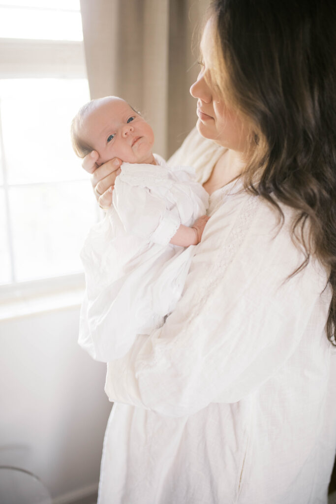 Ortega In Home newborn session documenting a mom and her new baby girl enjoying the first days of motherhood