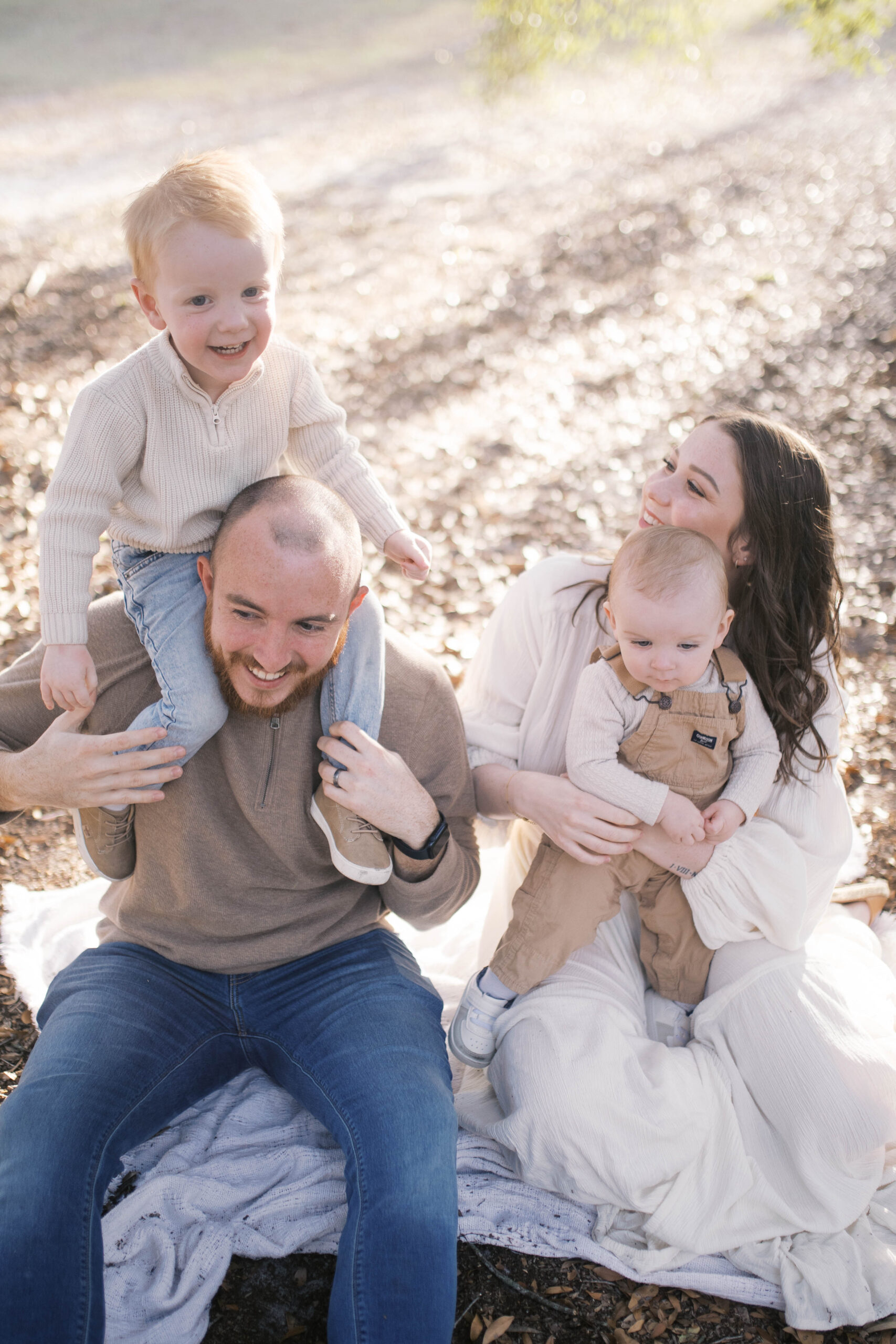 Family portrait taken in the fall at a park in Jacksonville FL